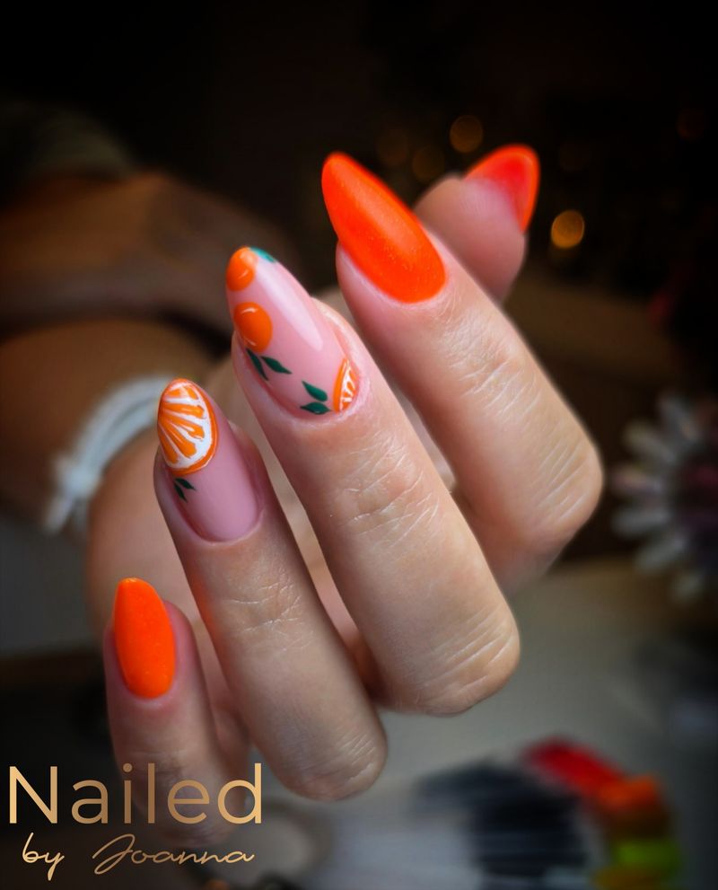 Orange nails with hand-painted orange slices