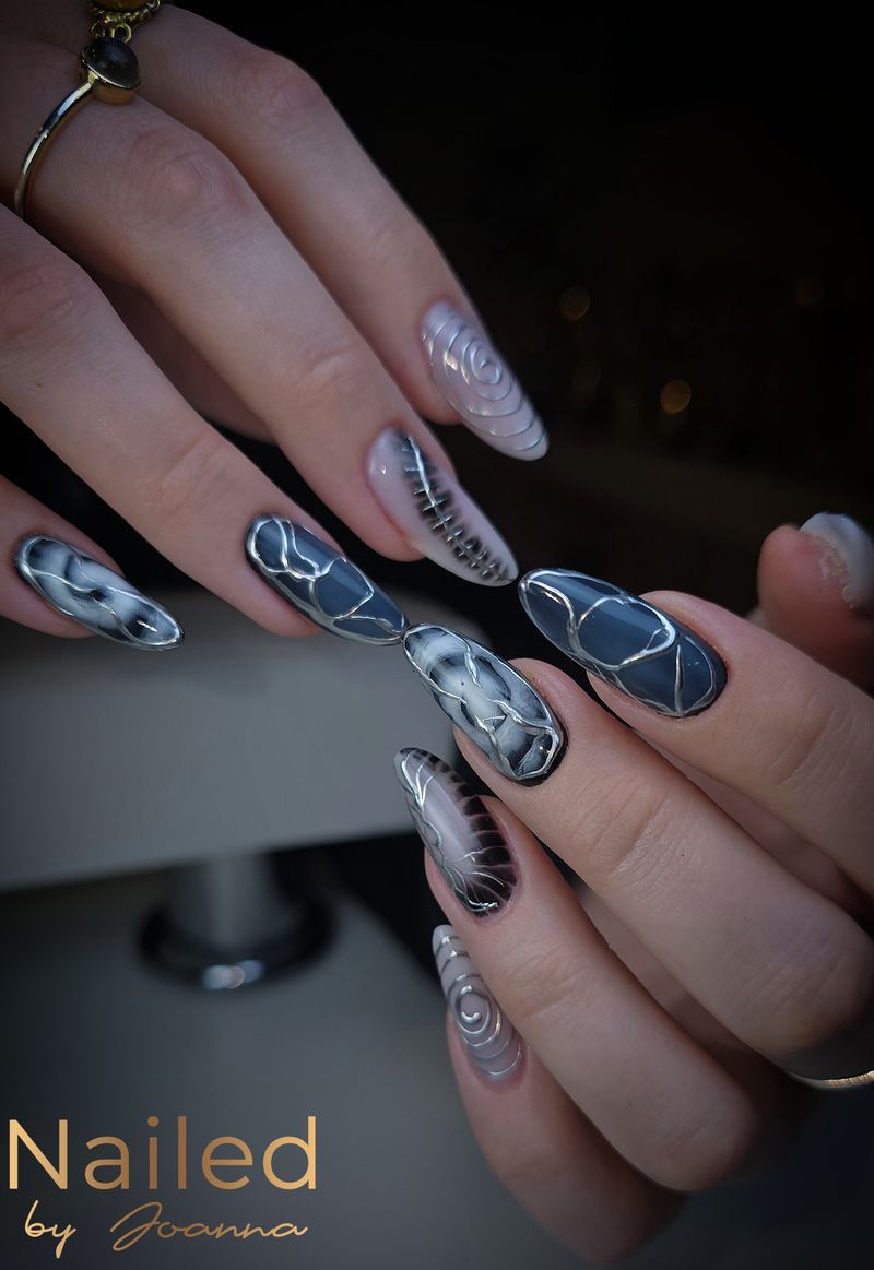 Black and white marble nail art on long nails