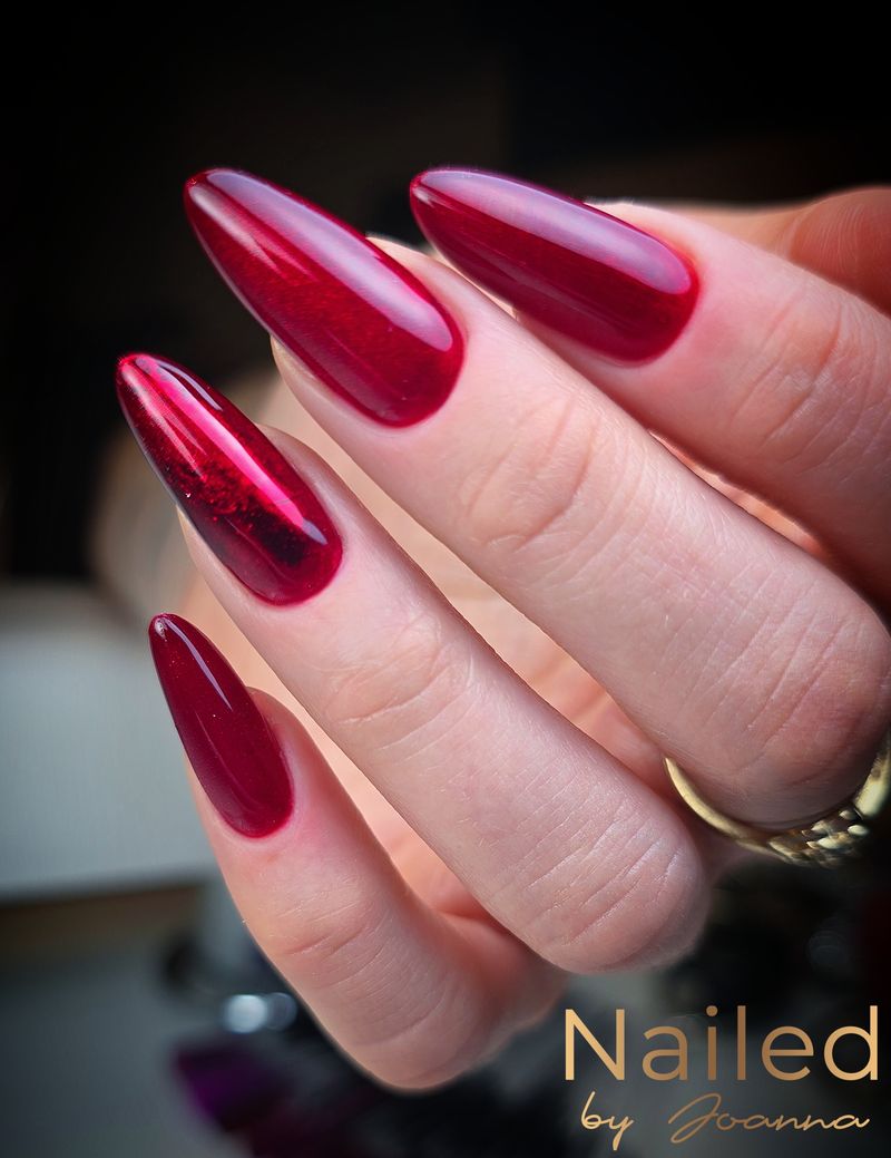 Burgundy almond nails with gloss design