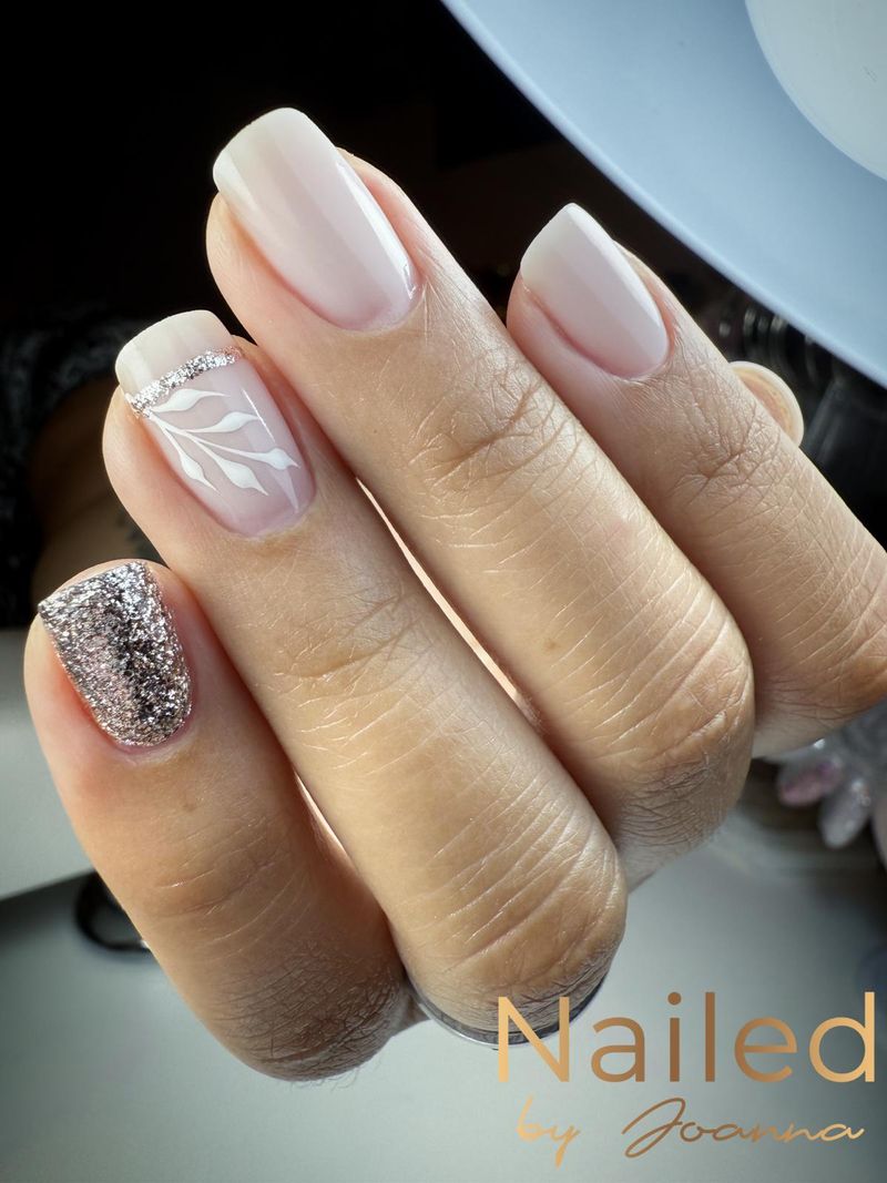 Nude French with white flower and glitter