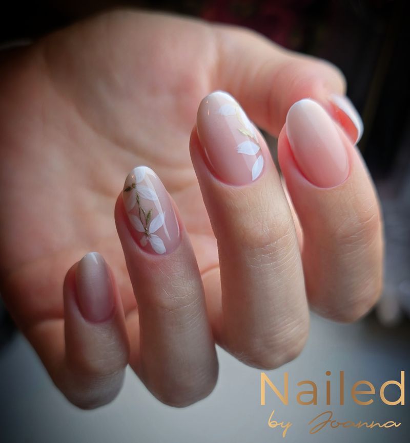 Nude nails with hand-painted flowers